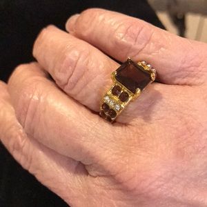 Brown amber and clear colored stone ring.